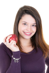 Portrait of a happy woman holding red apple and smiling