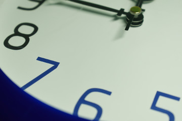 A clock dial view in close-up 