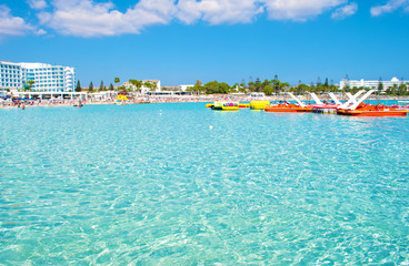 Rental with many yellow and orange paddleboats