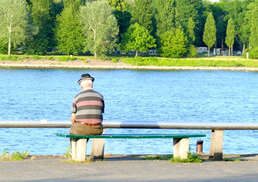 Older man sitting on a bench