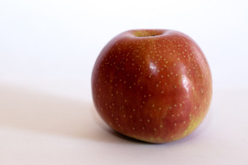 Isolated apple fruit on white background side view