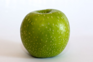 Isolated apple fruit on white background side view