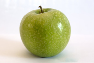Isolated apple fruit on white background side view