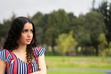 Fototapeta premium Beautiful young woman looks away