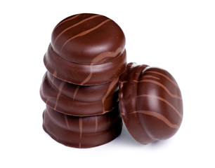 Chocolates with souffle on a white background. Isolation