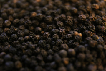 Macro close up of black peppercorns