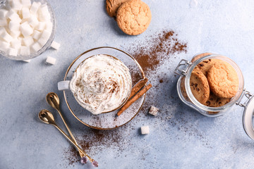 Cup with tasty coffee on table