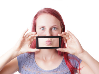 young woman messing around with camera phone