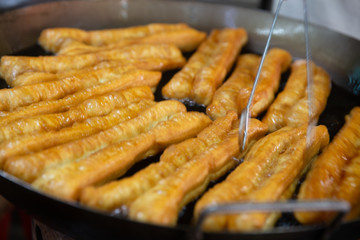 Frying Chinese Donuts