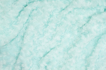 Pale teal rose plush fabric background