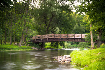 Fototapeta na wymiar Covered bridge park in Cedarburg Wisconsin during summer