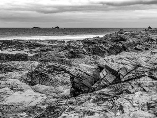 The rocky beach of Bedruthan Steps in Cornwall - an amazing landmark at the Cornish Coast