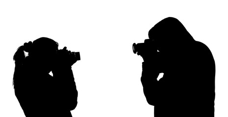 Black and white silhouette of photographers: women and men