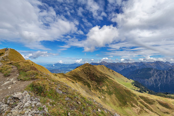 Fototapeta na wymiar Oberstdorf - View from narrrow Fellhorn mountain Ridge Hiking path to Alps-Panorama, Bavaria, Germany, 27.09.2017