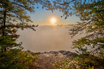 Obraz na płótnie Canvas Sunrise Through Fog at Big South Fork National River and Recreation Area, TN