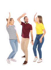 Obraz premium Young people celebrating victory on white background