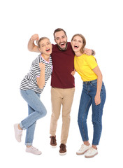 Obraz premium Young people celebrating victory on white background