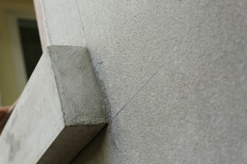 window frame on cement wall inside construction site building industry