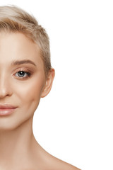 Fototapeta premium The beautiful female face. The perfect and clean skin of face on white. The beauty, care, skin, treatment, health, spa, cosmetic concept