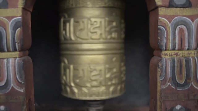 Dharma wheel at monastery in Buthan