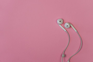 Fototapeta premium Headphones on a pink background