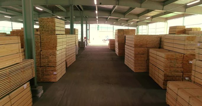 Warehouse timber, large timber warehouse drone video. A large warehouse of timber materials
