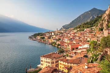 Obraz premium Scenic view on Lake Garda in Limone sul Garda town, famous tourist destination in Italy