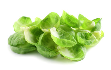 Obraz premium Leaves of fresh Brussels sprouts isolated on white