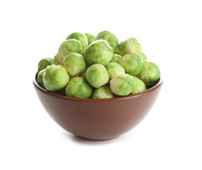 Bowl of fresh Brussels sprouts isolated on white