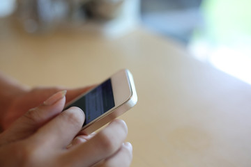 woman using app internet in mobile phone