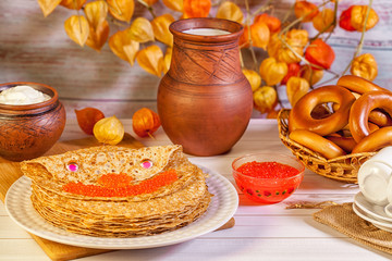 Comic still life with pancakes and red caviar, Russia