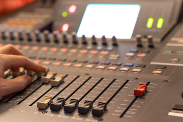 audio mixing console fader. recording, broadcasting, editing, post production concept