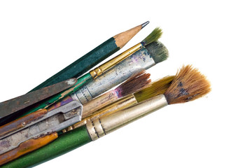 Old used paintbrushes.Used dirty paint brushes on white background