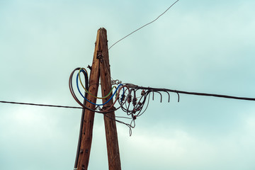 Wooden electricity pylon with wires