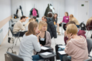 People at the seminar on negotiations, training, teamwork.