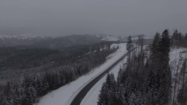 Aerial footage of the winter snow coniferous Christmas forest. 4k