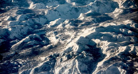 Aerial view of Sierra Nevada mountains in California during the 2019 record setting snowfall season