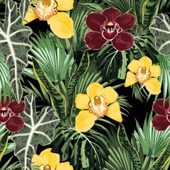 Tropical jungle plants, yellow burgundy orchid flowers and palm monstera leaves on black background. Beach seamless pattern.