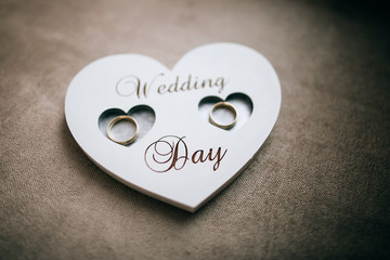 Handmade wooden heart for the wedding rings