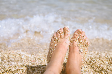feet by the sea