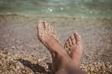 feet by the sea