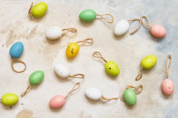 Easter background. Decorative Easter eggs on colorful background. Copy space, top view.