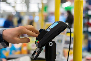 payment for purchases at the checkout at the supermarket