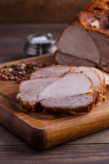 veal roll on wooden board