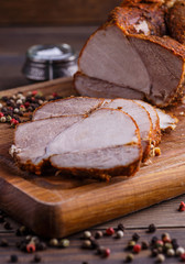 veal roll on wooden board