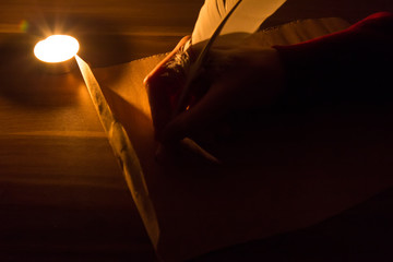 write a letter on the soft light candle.