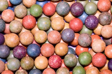 Clay marbles (balls). Retro toys. Vintage toys. Shoot (roll/play) marbles. Image can be used as...