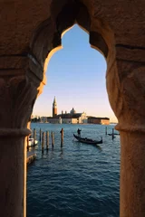 Fotobehang view of the basilica San Giorgio Maggiore ( 16th-century benedictine church on the island of the same name in Venice ) through the bridge fence, Italy © irisphoto1