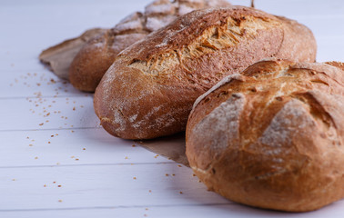 Freshly Baked Homemade Bread, close-up, isolated on a white background.