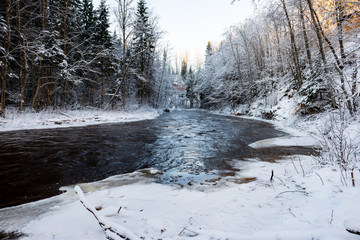 frozen forest river in winter